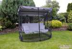 Huśtawka ogrodowa 49 x 155 z poduszkami, podstawkami na napoje i moskitierą za 899zł @ Allegro